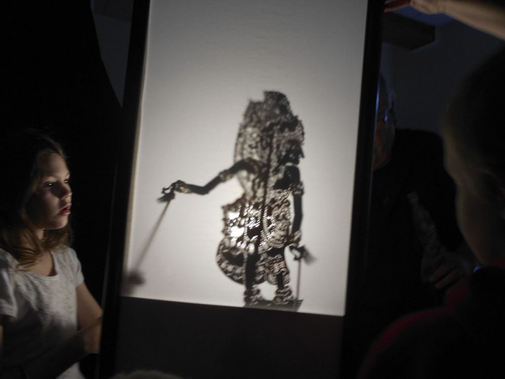 Girl with shadow puppet