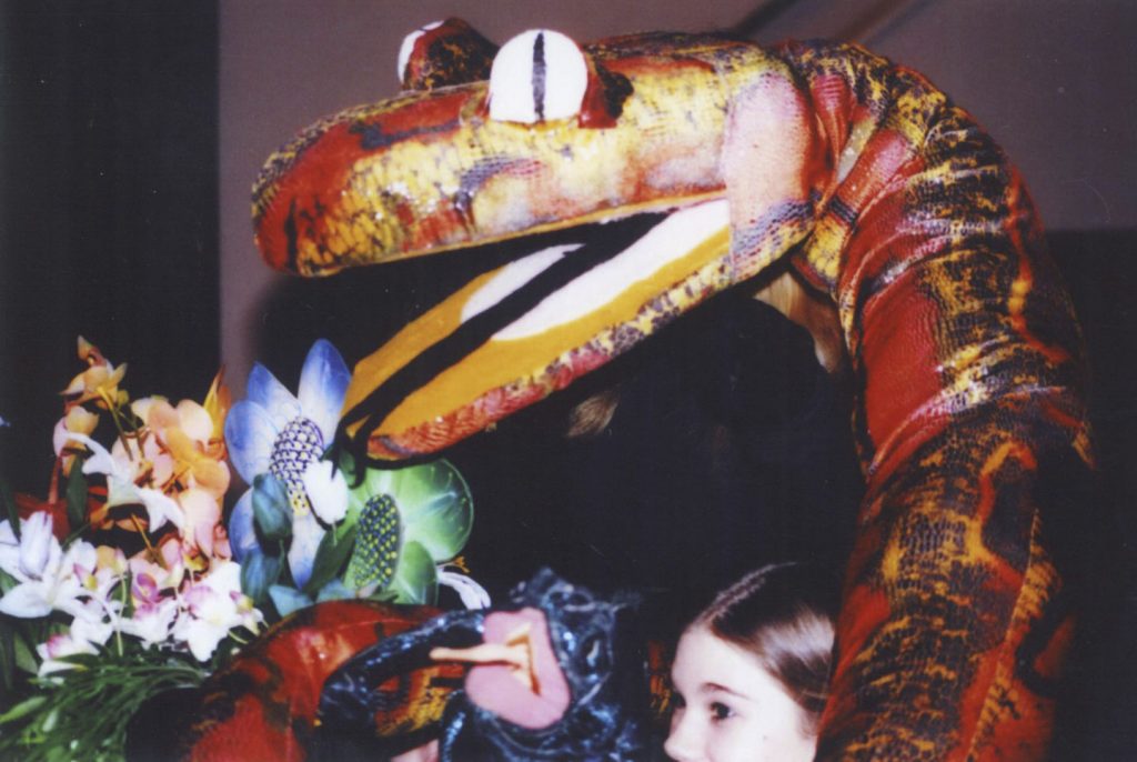 Snake puppet and girl
